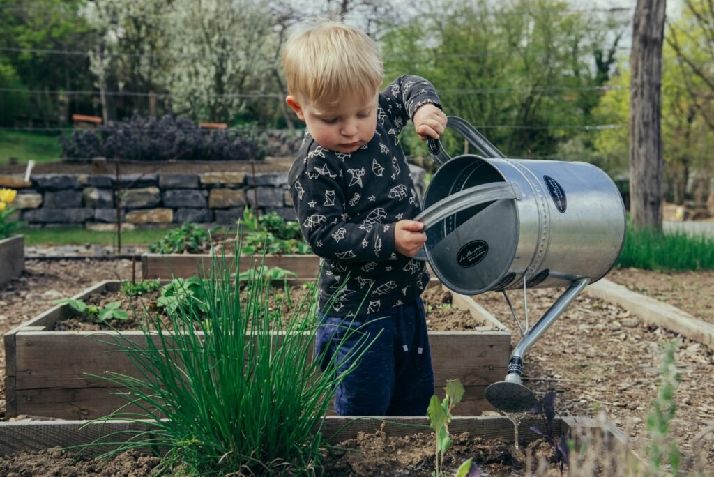 Young child gardening